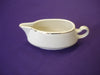 Gravy bowl with gold trim