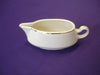 Gravy bowl with gold trim